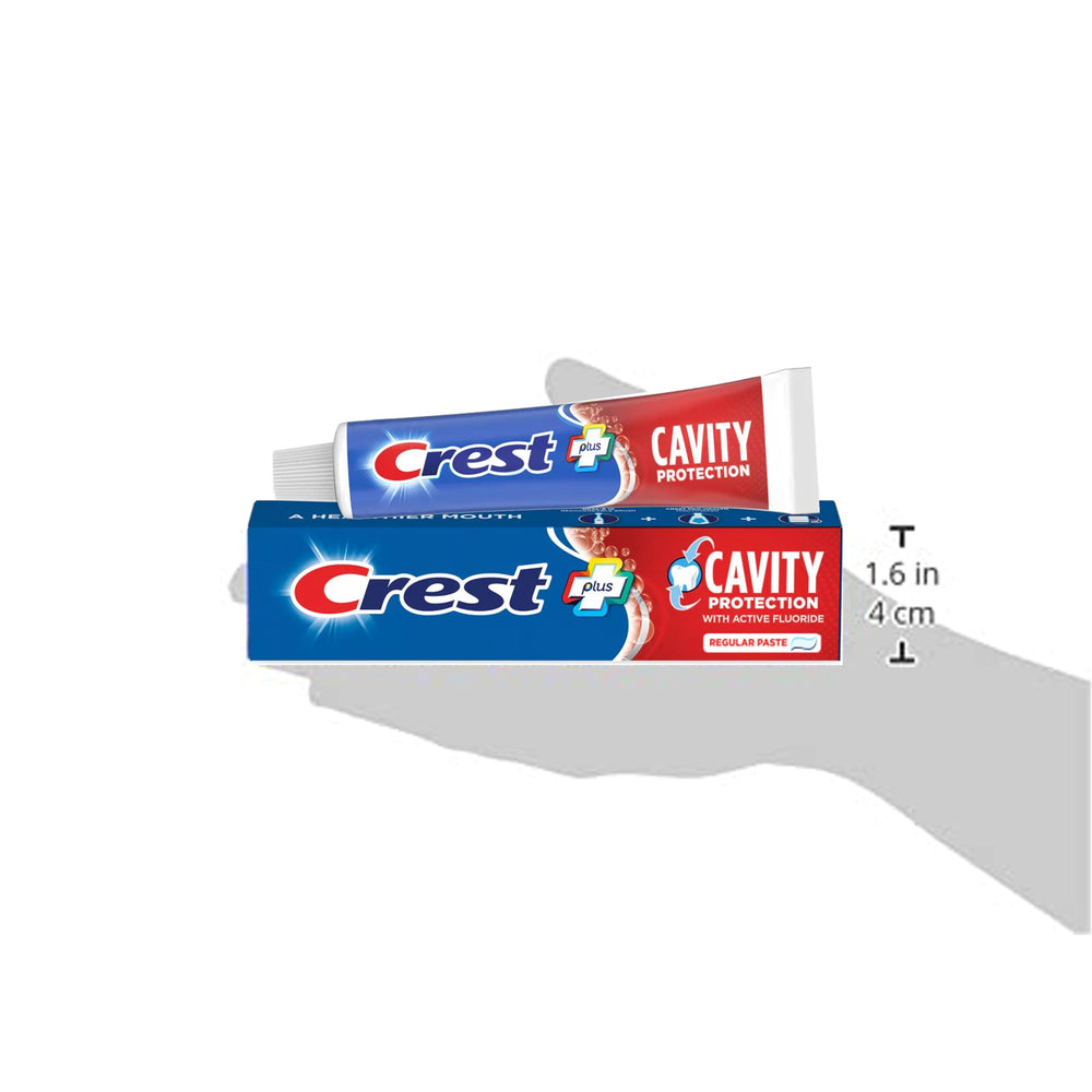 Toothpaste being squeezed onto a toothbrush