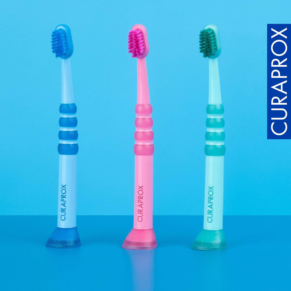 Soft rubberised brush head protecting delicate oral mucosa