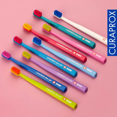 Assorted random colour Curaprox CS 5460 toothbrushes in packaging