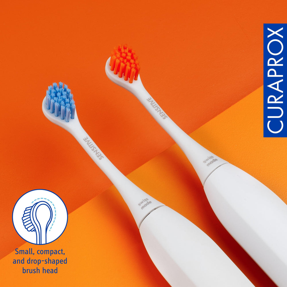 Drop-like compact brush head design for focused cleaning