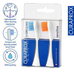 Close-up of Hydrosonic Rainbow Sensitive Duo brush head in orange