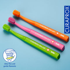 Soft rubberized brush head with anti-slip grip