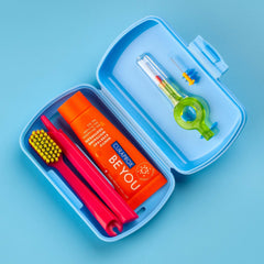 CS 5460 travel toothbrush close-up inside the blue kit