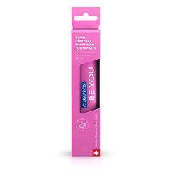 Close-up of Curaprox whitening toothpaste showing enzymatic formula on label