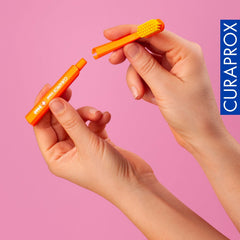 Travel toothbrush head being attached to handle