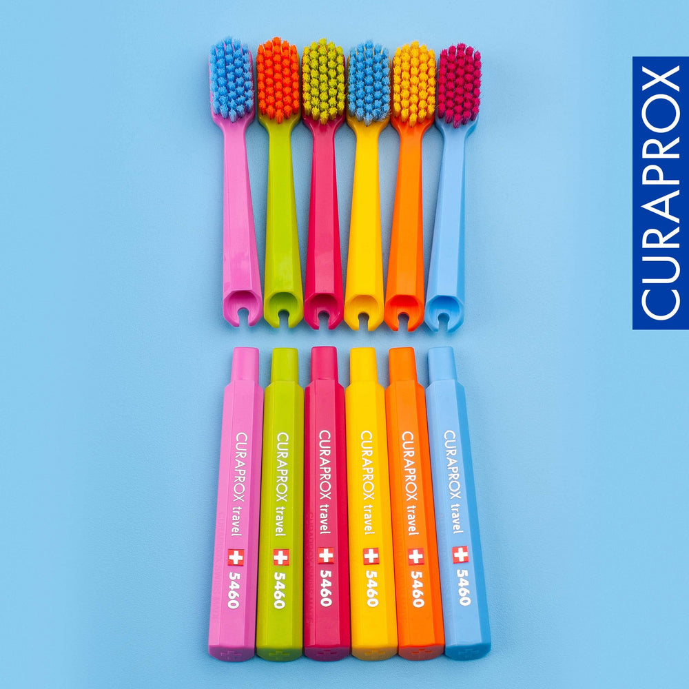 Lifestyle image showing travel toothbrush with replacement heads