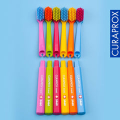 Lifestyle image showing travel toothbrush with replacement heads