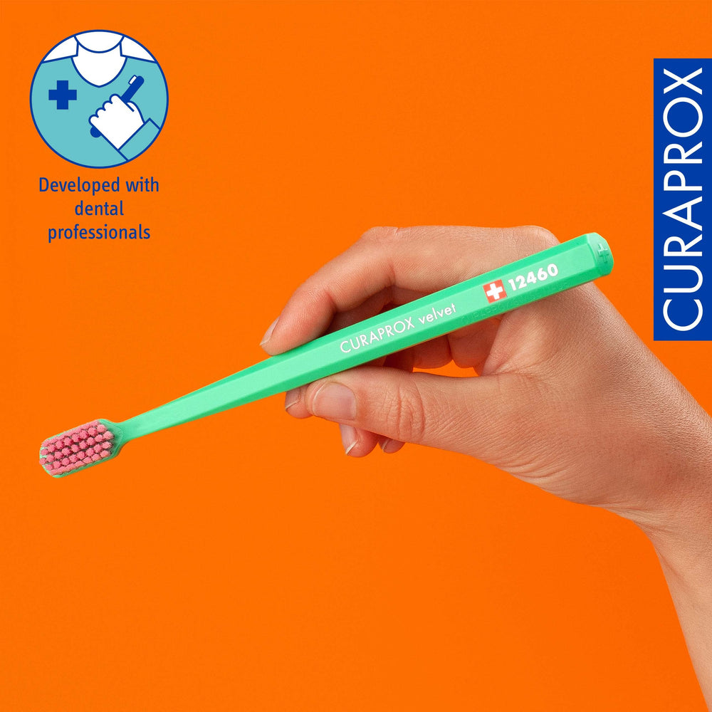 Compact angled brush head designed for the gumline