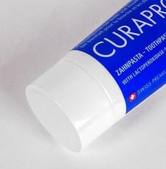Curaprox Enzycal 1450 ppm toothpaste tube, 75 ml, front view