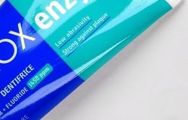 Close-up of Curaprox Enzycal toothpaste tube
