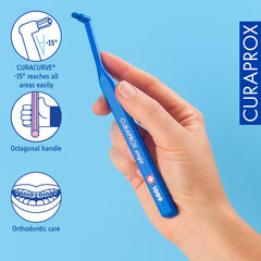 Toothbrush head showing rounded Curen filaments