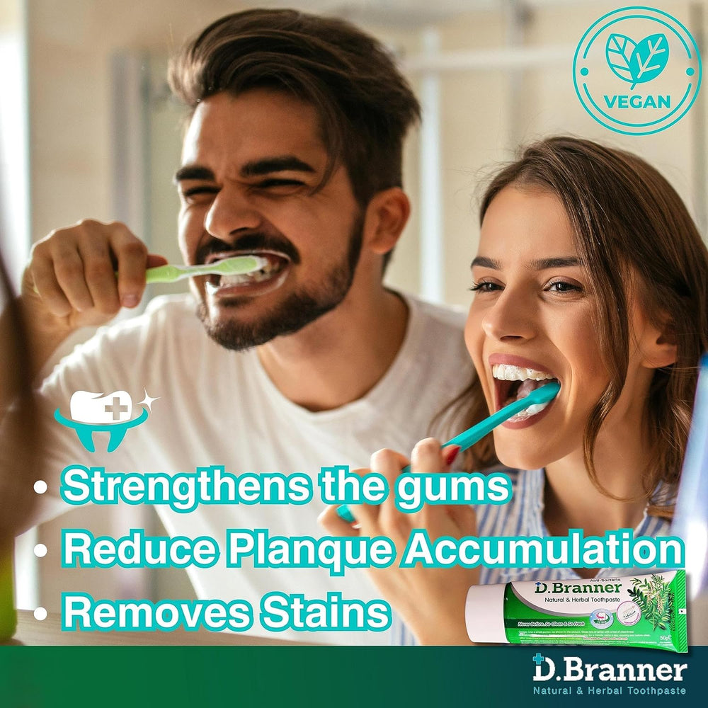 Person brushing teeth with herbal toothpaste in bright bathroom