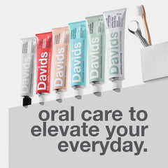 Metal tube squeezer included with toothpaste