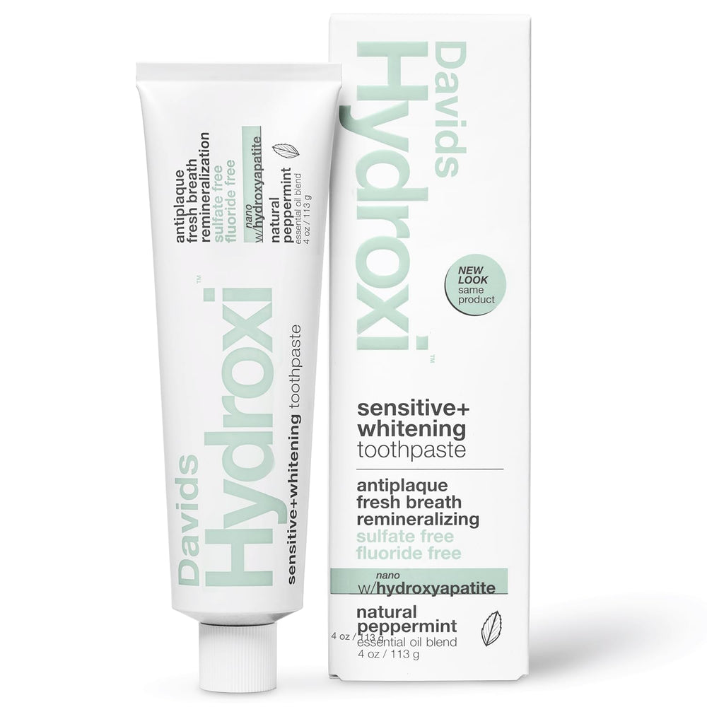 Front view of Davids Hydroxi toothpaste tube on white background