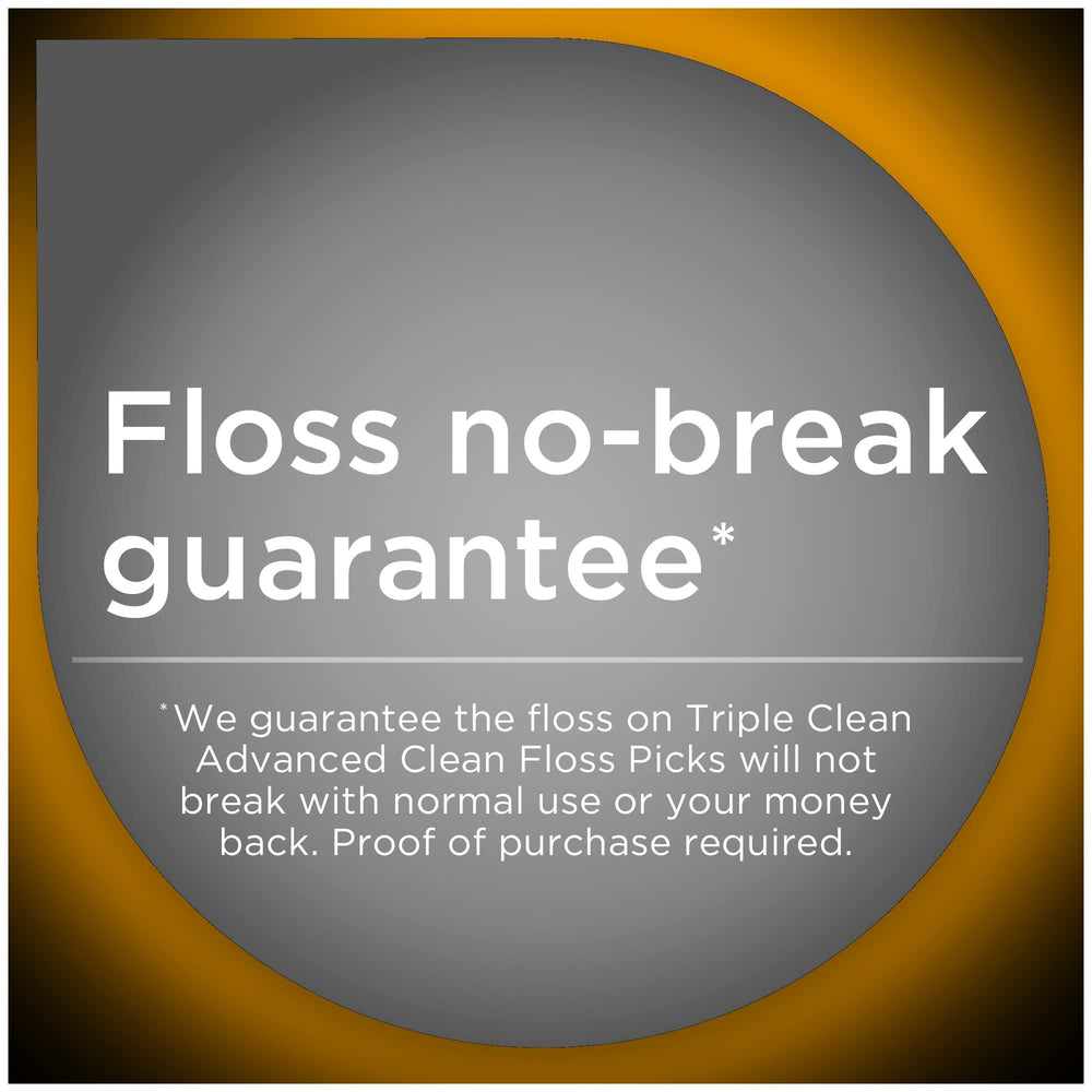 Floss picks in use between teeth