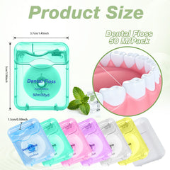 Close-up of a mint-flavored floss spool inside a compact box