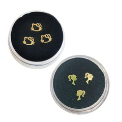 Close-up of small and large tooth gems (3x3mm and 5x6mm)