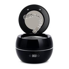 Front view of the black dental ultrasonic retainer cleaner