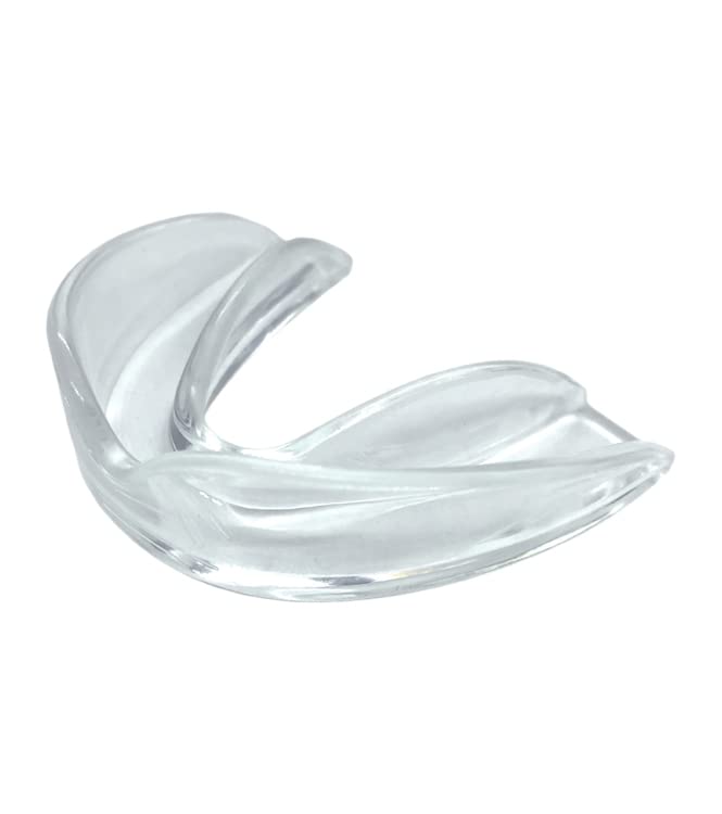 Mouth guard in use at night with sleeping person silhouette