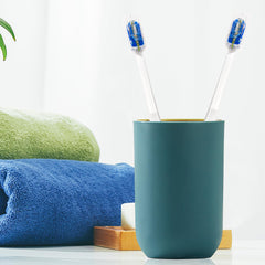 Four toothbrushes with protective covers in a 4 pack