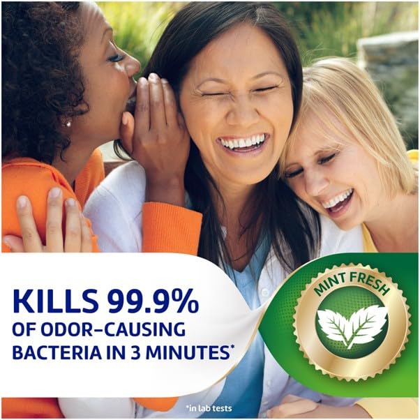 Close up of denture brush heads cleaning denture surfaces