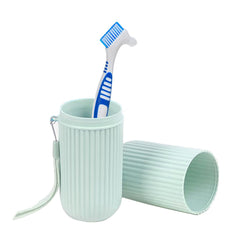 Denture kit package display showing brushes and cases