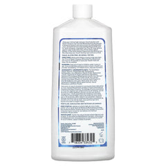 Desert Essence mouthwash label close-up Tea Tree Oil Whitening