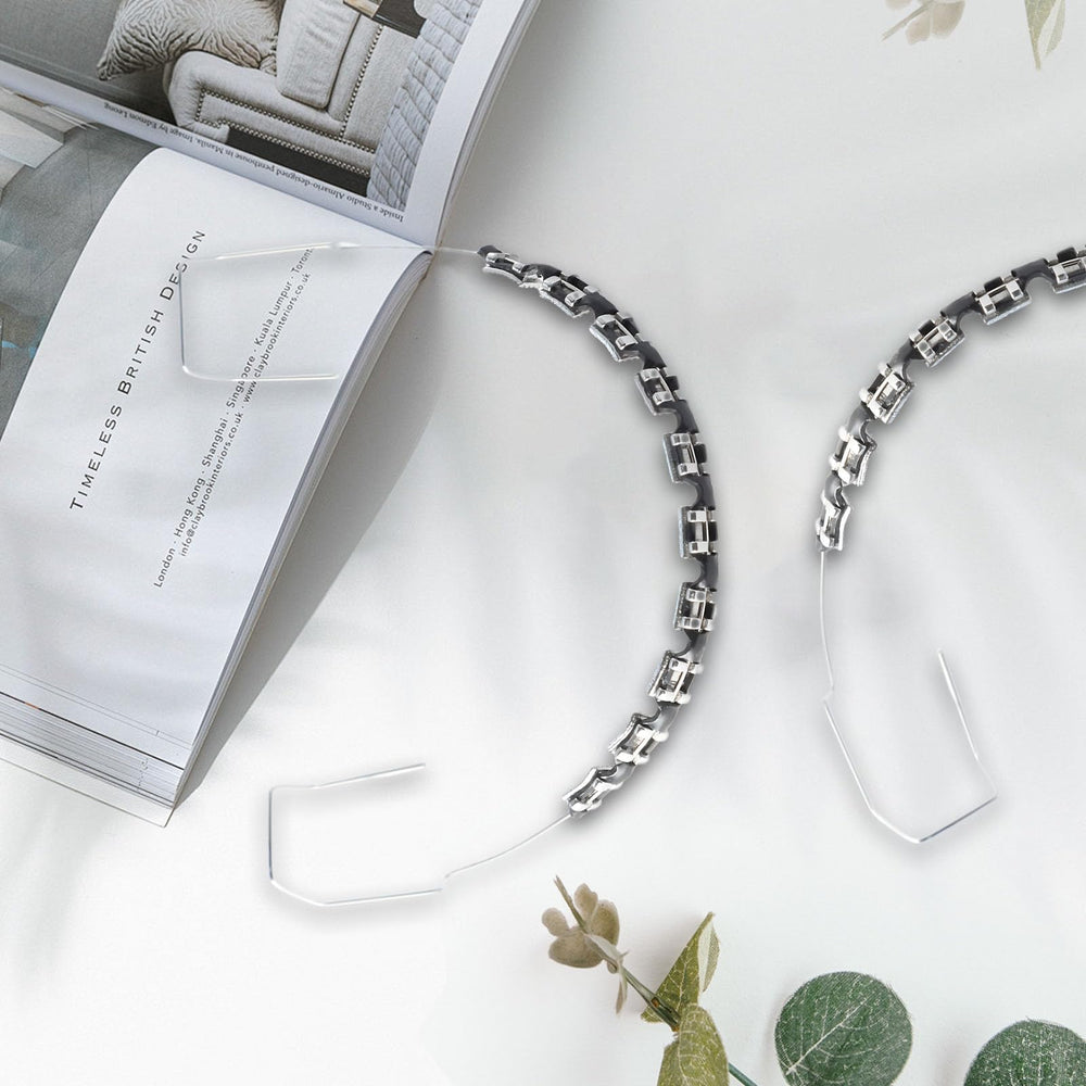 Display demo of black braces used for orthodontic practice