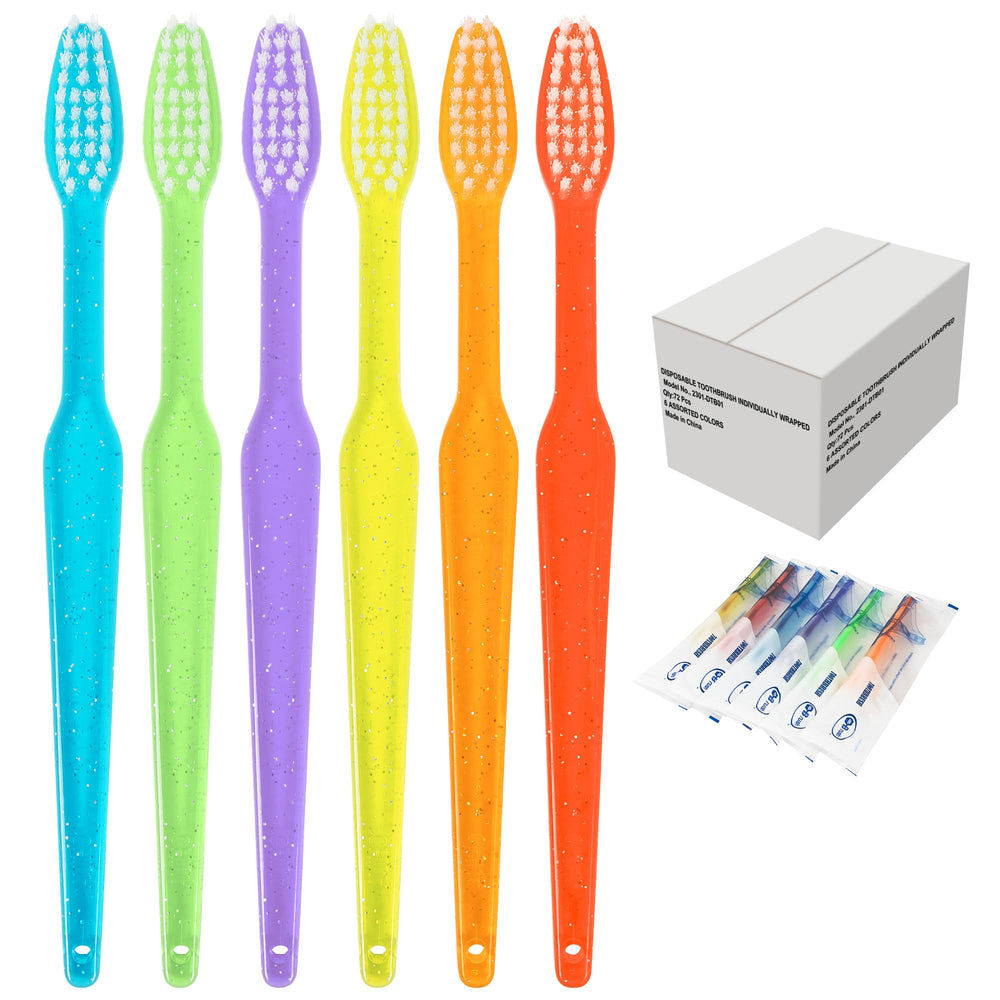 Disposable travel toothbrush with red handle and decorative dots