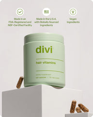 Top view of Divi Hair Vitamins bottle and 120 capsules