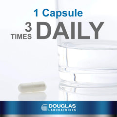 Capsules displayed beside the Douglas Laboratories bottle for scale
