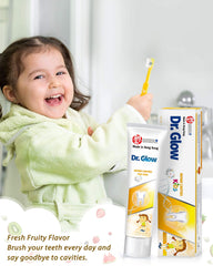 Toddler dental care setup featuring Dr. Glow toothpaste