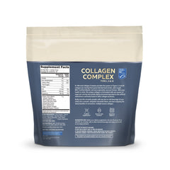 Serving scoop next to Dr Mercola Collagen Complex Powder chocolate