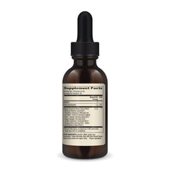 Close-up of bottle with natural herbal ingredients background