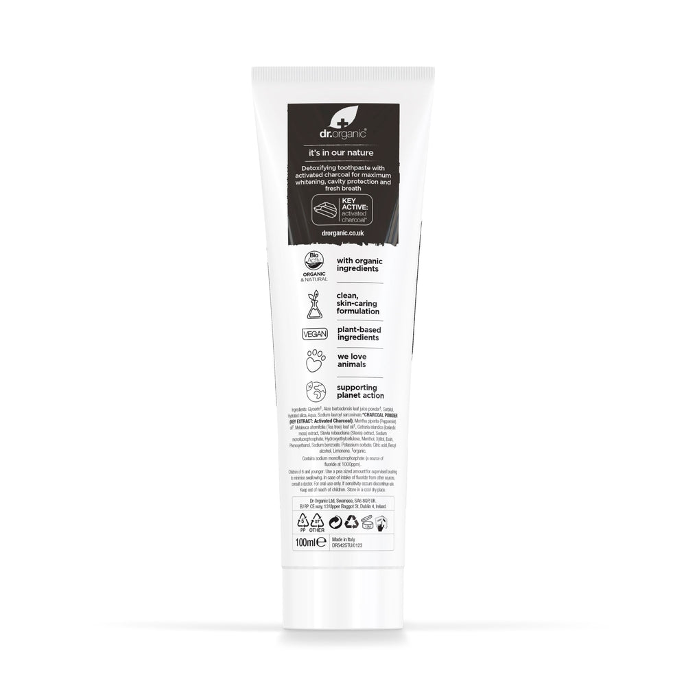 Close-up texture of toothpaste with charcoal and mint