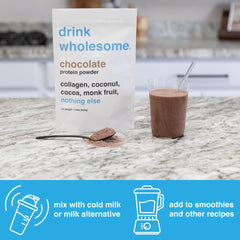 Drink Wholesome Chocolate Collagen Powder scoop with measuring lines for precise gut-friendly servings