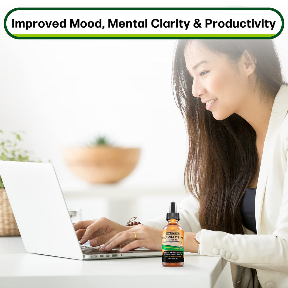 Pipette dispensing a liquid drop from the bottle