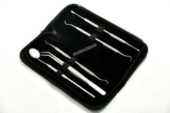Dual-head scaler and dental pick in use