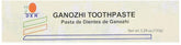 DXN Ganozhi Toothpaste with Ganoderma bottle and packaging