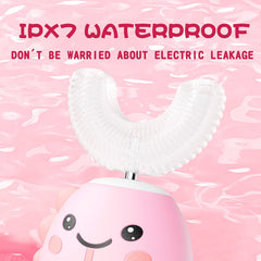 Cartoon dinosaur design on pink toothbrush