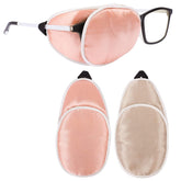 eZAKKA eye patches for adults in brown and orange worn over glasses