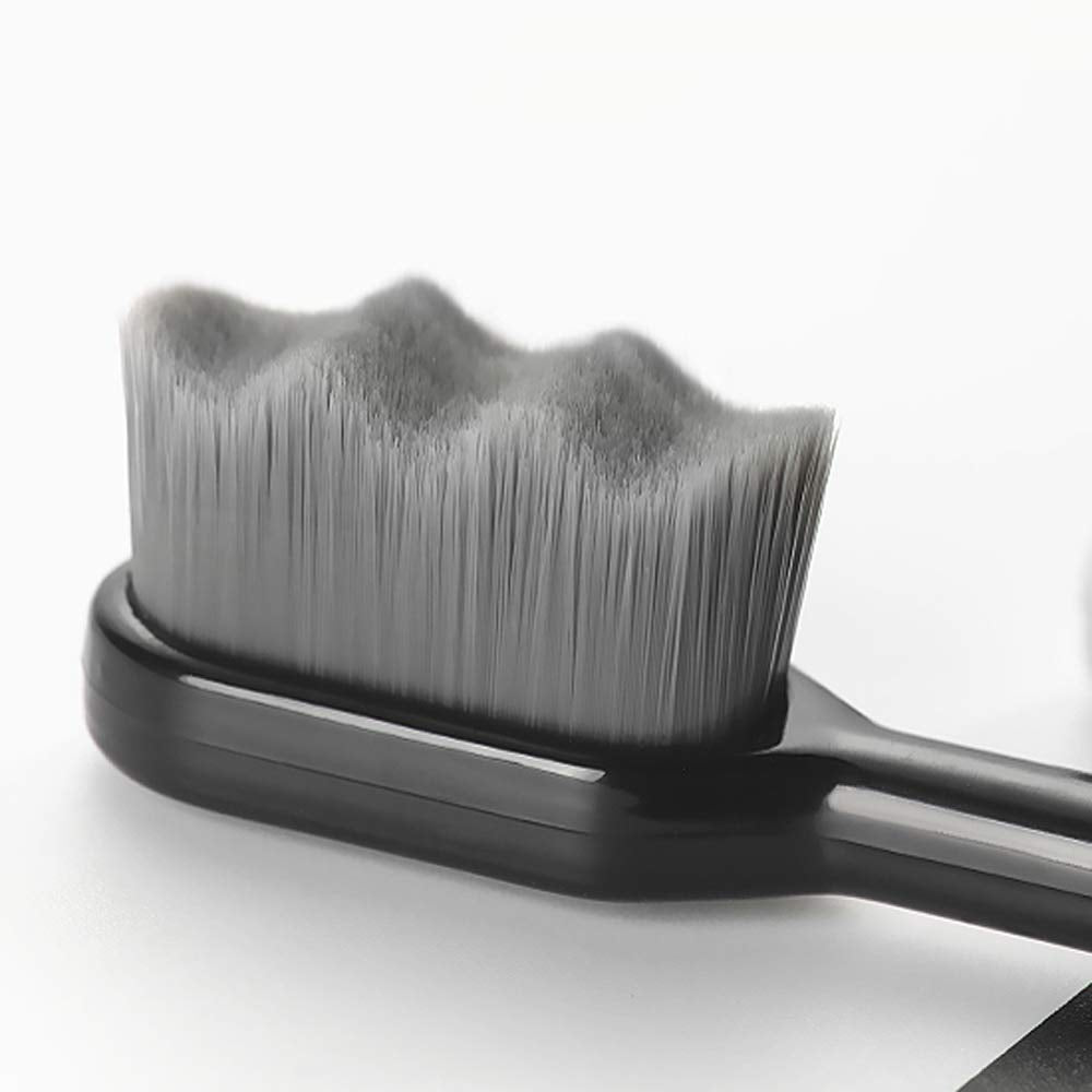Close-up of ultra-soft bristles and ergonomic handle for gentle cleaning