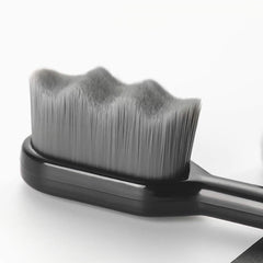 Close-up of ultra-soft bristles and ergonomic handle for gentle cleaning