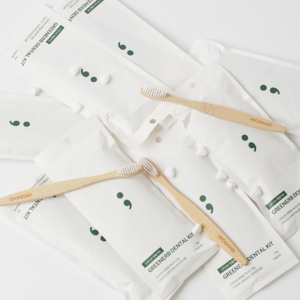 Smiling person using Greenerb eco-friendly dental kit