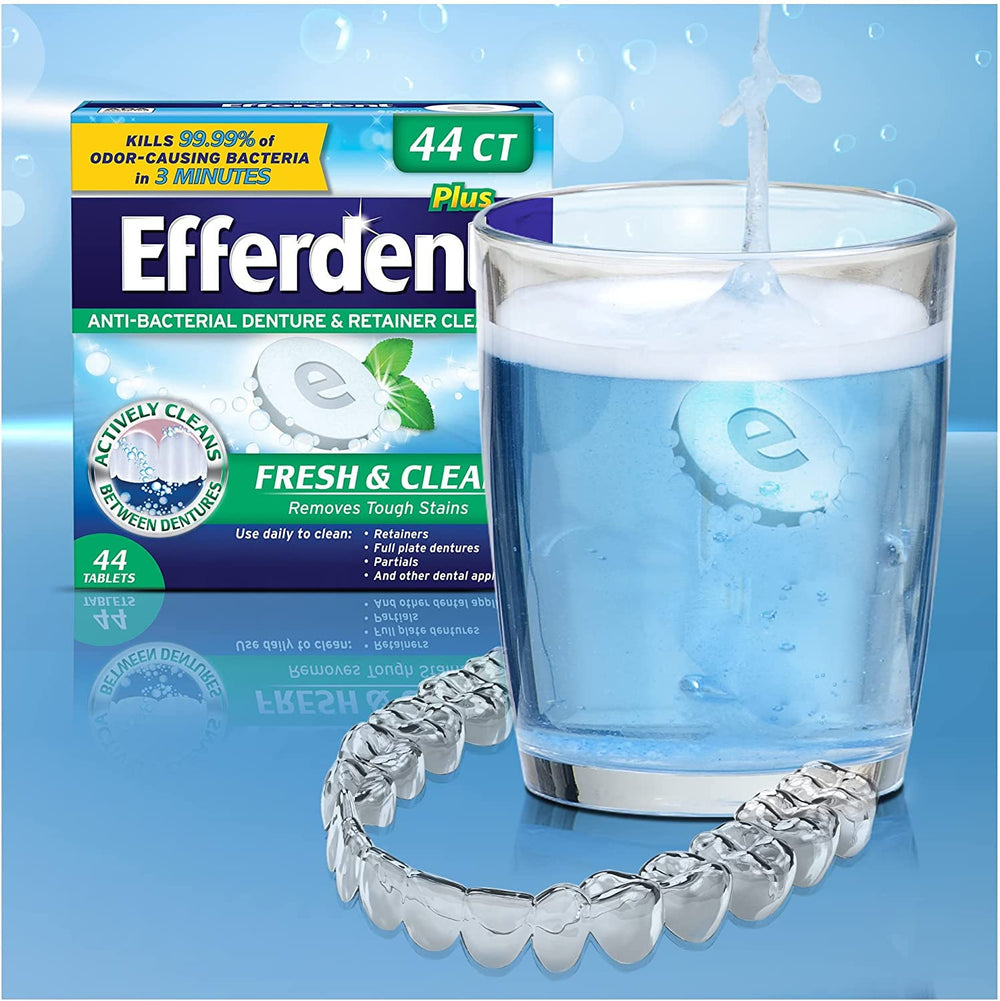Oxi-action Efferdent cleaning tablet dissolving in water