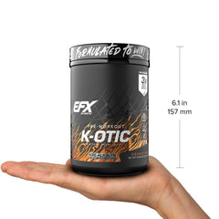 Preparing to mix K-OTIC in glass – Orange Mango