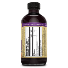 Close-up of elderberries and raw honey for immune support