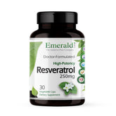 Emerald Labs Resveratrol bottle and capsules on white background