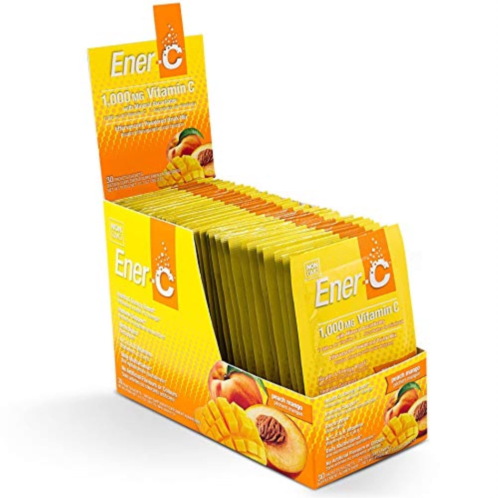 Glass with Ener-C Peach Mango effervescent vitamin C dissolving