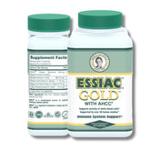 Bottle of Essiac Gold® with AHCC® capsules on white